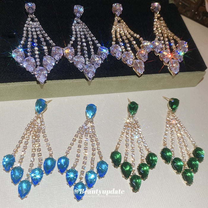 Gold Crystal Teardrop Chandelier Stud Earrings with Polished Metal Details