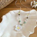 White Daisy Pendant Necklace with Green and Brown Beads view 4