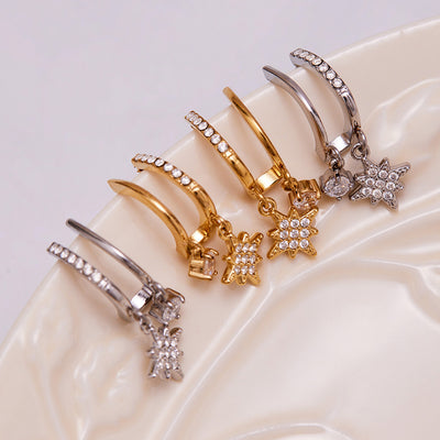 Display view of heart eight point star drop earrings in main image 1.