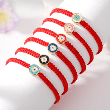 Red Woven Cord Bracelets with Small Round Eye Centerpieces
