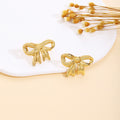 Thirty Gold Tone Sculptural Leaf Heart Shell and Geometric Earrings view 5