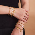 Crystal Station Charm and Fish Skeleton Bracelets in Two Finishes view 4