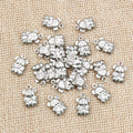 Tiny Hollow Bear Stainless Steel Charms in a Silver Tone view 2