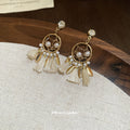 Pearl Circle White Tassel Drop Earrings with Gold Tone Details view 4
