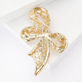 Filigree Ribbon Bow Brooch With Pearl in Gold or Silver Tone view 3