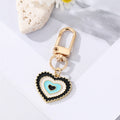 Gold Tone Layered Round Heart and Lash Evil Eye Clip Keychains view 12