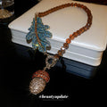 Amber Bead Necklace Teal Leaf Acorn Rhinestone Toggle view 3