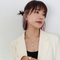 Gold Rope Chain Necklace with Spiral Disc Faux Pearl Pendant view 3