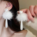 White Pom Pom Pearl Teardrop Stud Earrings With Decorative Metal Accents view 1