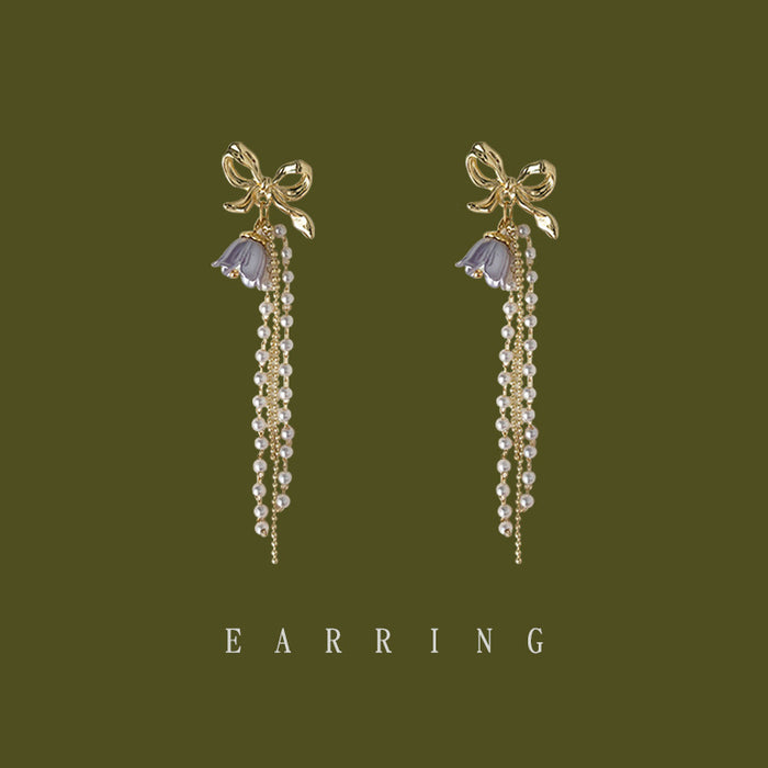 Gold Tone Bow Purple Flower Pearl And Chain Tassel Stud Earrings