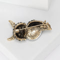 Antique Owl Brooch With Faceted Crystals And Polished Metal Details view 3