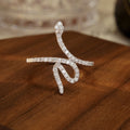 Silver Tone Curved Snake Open Ring With Clear Stone Surface view 2