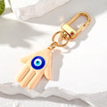 Gold Tone Colorful Hamsa Evil Eye Clip Keychains in Nine Colors view 11
