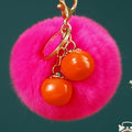 Twin Persimmon Plush Pom Keychains in Fifteen Listed Loop Colors view 10