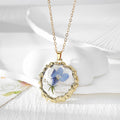 Round Birth-Flower Pressed Botanical Pendant Necklaces in Nineteen Designs view 5