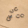 Silver Tone Ear Cuffs In Three Sculpted Textured Styles view 3