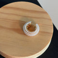 White Pearl Row C Ear Cuff Single Piece for Layered Everyday Styling view 4