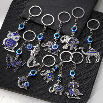 Silver Tone Animal Mermaid Butterfly and Blue Eye Keychains