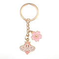 Gold Tone Butterfly Skull and Sakura Flower Clip Keychains view 9