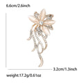 Crystal Floral Spray Brooch With Polished Metal And Sculpted Decorative Details view 6