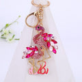 Pair of Pink Jeweled Flamingo Keychains with Gold Tone Hardware view 3