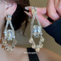 Clear Crystal Chandelier Earrings in Gold and Silver Tone view 4