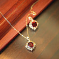 Gold Tone Red Stone Ornate Pendant Necklace with Polished Finish view 3
