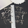 Silver-Tone Bow and Butterfly Metal Charms with 18 Listed Options view 4
