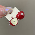 Asymmetric Apple Stud Earrings in Red and Green with Polished Metal Details view 6