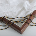 Black Round Bead Gold Hexagon Spacer Necklace Strand view 2