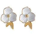 White Enamel Flower Stud Earrings Gold Leaf Accent Pair view 5