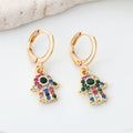 Gold Tone Crystal Heart, Lightning, Eye and Hamsa Huggie Earrings view 7