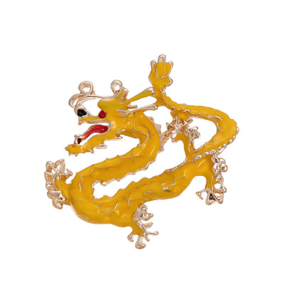 Front product view of the zodiac animal brooch pin in gold and yellow