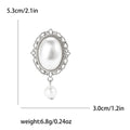 Oval Pearl Drop Brooch with Polished Metal and Decorative Accents view 7