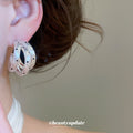 Layered Silver Tone Hoop Earrings with Black Dot Details view 3