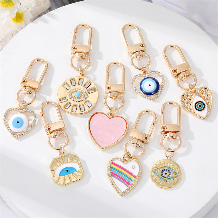 Gold Tone Enamel and Crystal Heart Evil Eye Clip Keychains