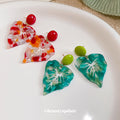 Translucent Leaf Drop Earrings with Bright Green or Red Round Studs view 4