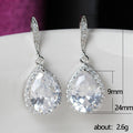 Silver Tone Teardrop CZ Halo Drop Earrings Purple Blue Clear view 5
