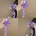 Purple Fabric Flower Hair Clip Cascading Bell Bloom view 1