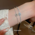 Oval Crystal Center Tennis Bracelet In Gold Or Silver Tone view 1