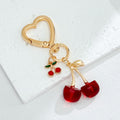 Red Cherry Charm Bag Keychain with Gold-Tone Hardware view 10