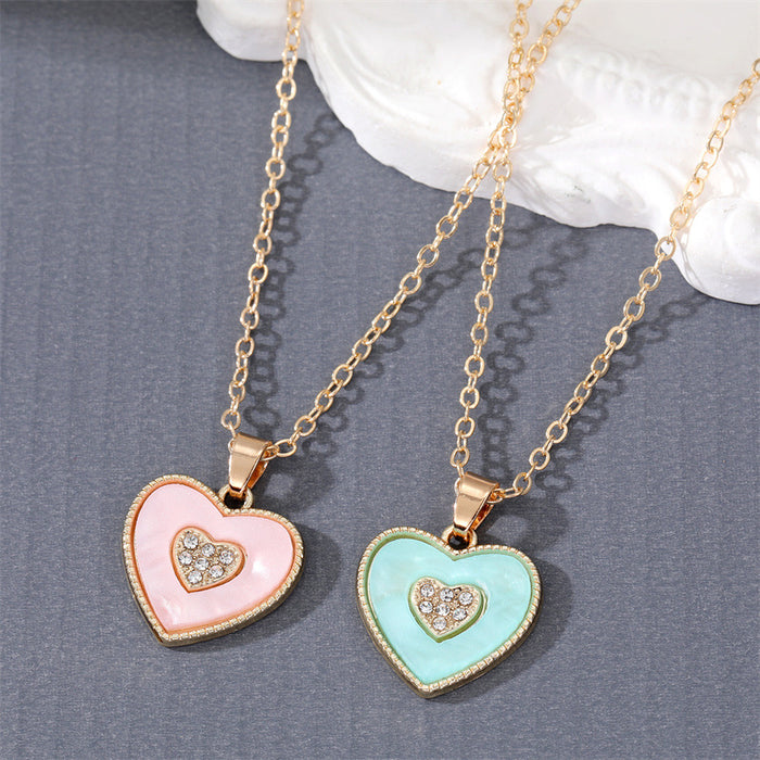 Gold Tone Crystal Enamel Heart Pendant Necklaces in Two Colors