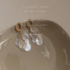 White Disc Tassel
