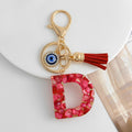 Red Resin Shell Letter Keychain with Evil Eye and Tassel view 8
