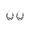 Layered Silver Tone Hoop Earrings with Black Dot Details view 5