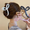 Crossed Loop Acrylic Hair Claw In Pink Marbled Or Gray Black view 1