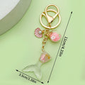 Starfish, Shell and Mermaid Charm Keychains Featuring Blue Shell Across 29 Variations view 11
