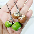 Double Coconut Resin Phone Strap Charms in Brown or Green view 2
