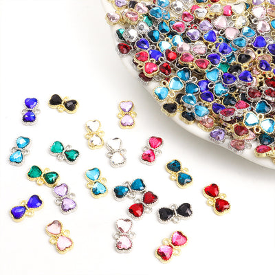 Grouped front view of faceted glass bow connector jewelry components for diy earrings and bracelets options