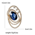 Oval Orbit Crystal Brooch in Emerald Green or Navy Blue view 7